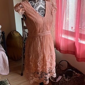 Beautiful dress, very stylish and elegant. Size S